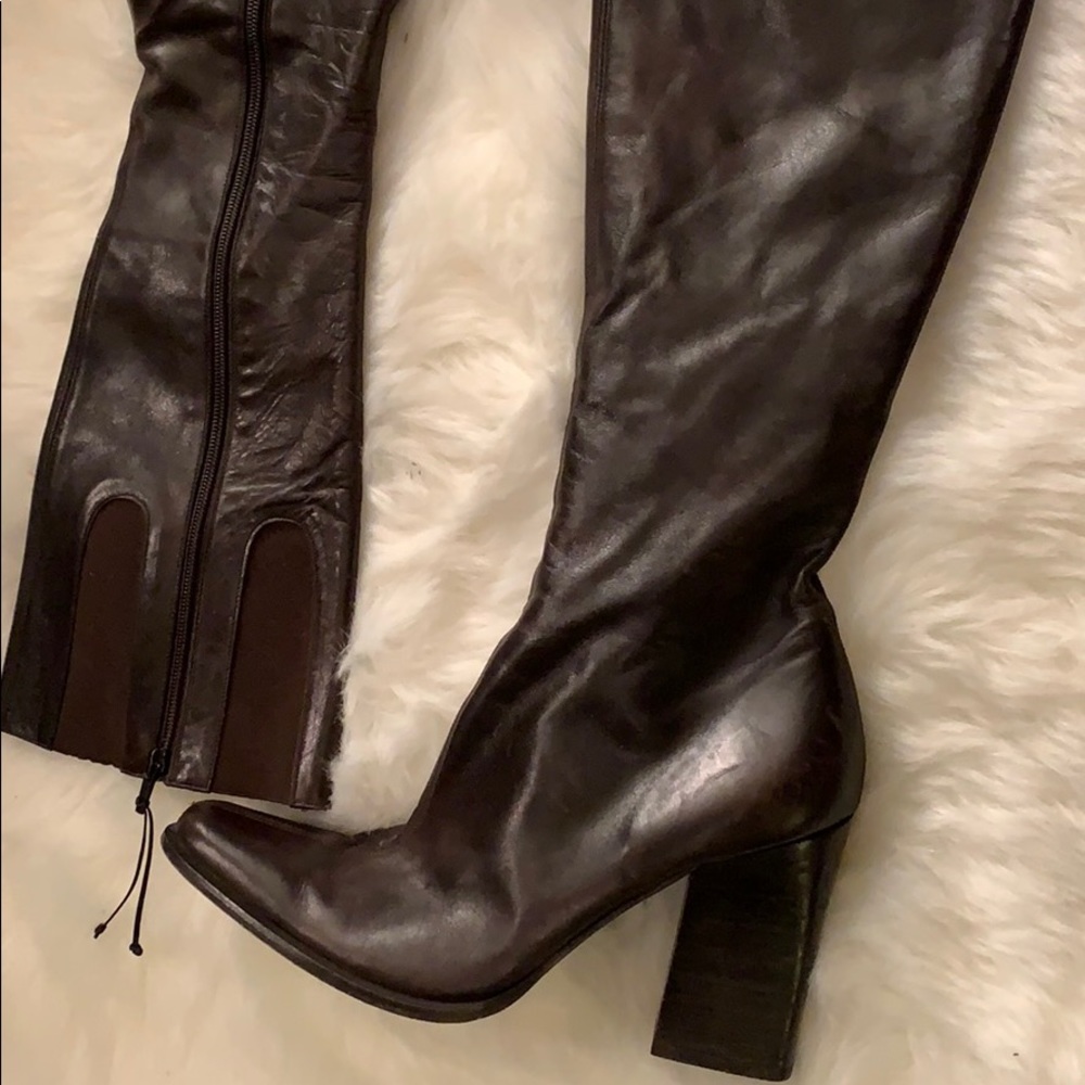 Brown leather knee high heeled boot